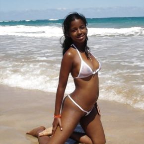ebony cutie knows everyone can see her tits, but doesn’t care.