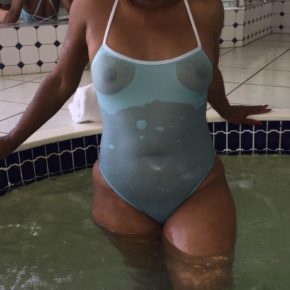 amateur ebony milf in see through one piece bikini in the hot tub.