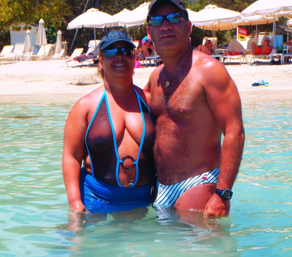 chubby mom on the beach in a see through one piece