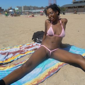 cute ebony girl in see through clit bikini in public