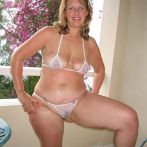 a mom on vacation in completely sheer bikini