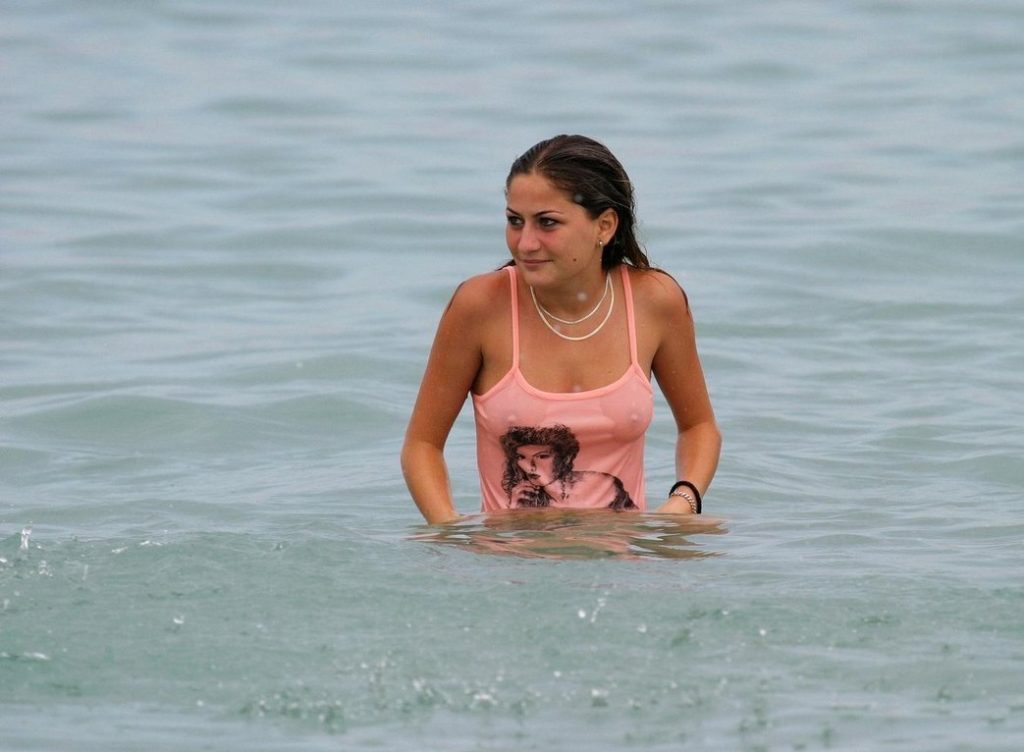 see through tank top by accident at the beach.