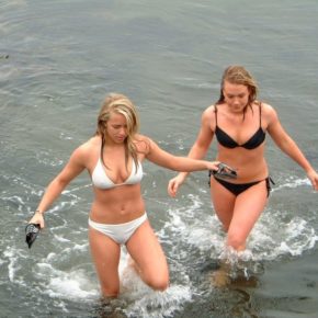 cute girl doesn’t realize that you can see her pussy and tits through her bikini.