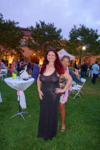 mom in a sheer dress at a cocktail party