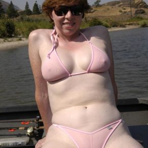 redhead milf in see through bikini at the lake