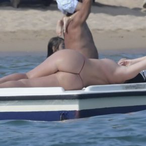 celebrity in a t-front thong and her tits out. [gallery]