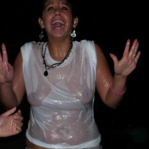 embarrassed girl gets her t-shirt wet with no bra